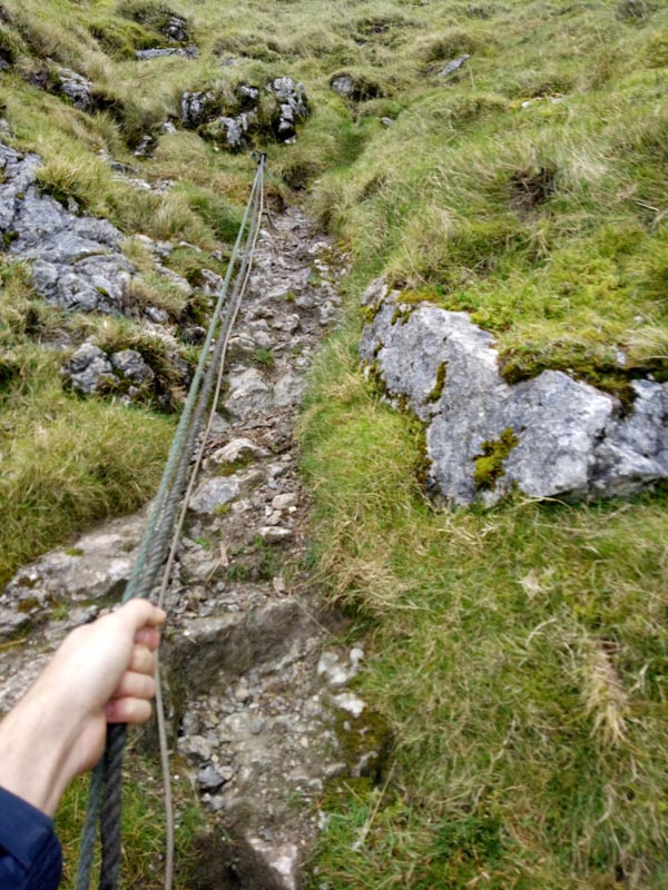 Rope leading up to the cave