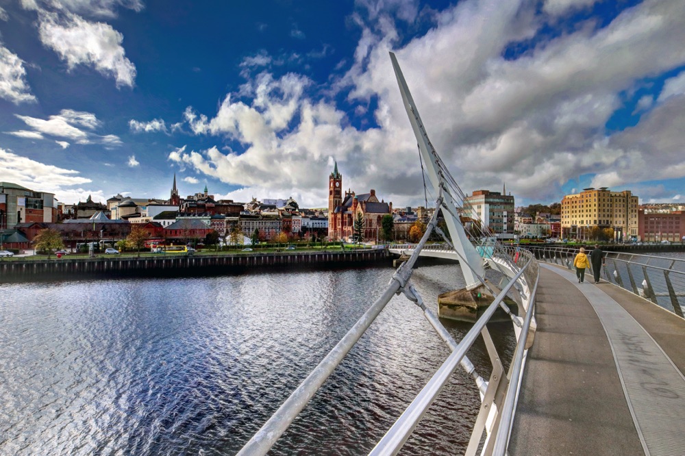 places to see in derry peace bridge with the river below