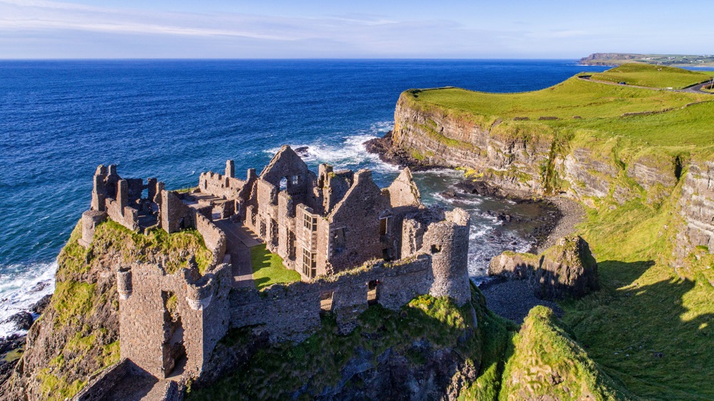 Dunluce Castle ruins on basalt cliffs above the Atlantic coast, County Antrim