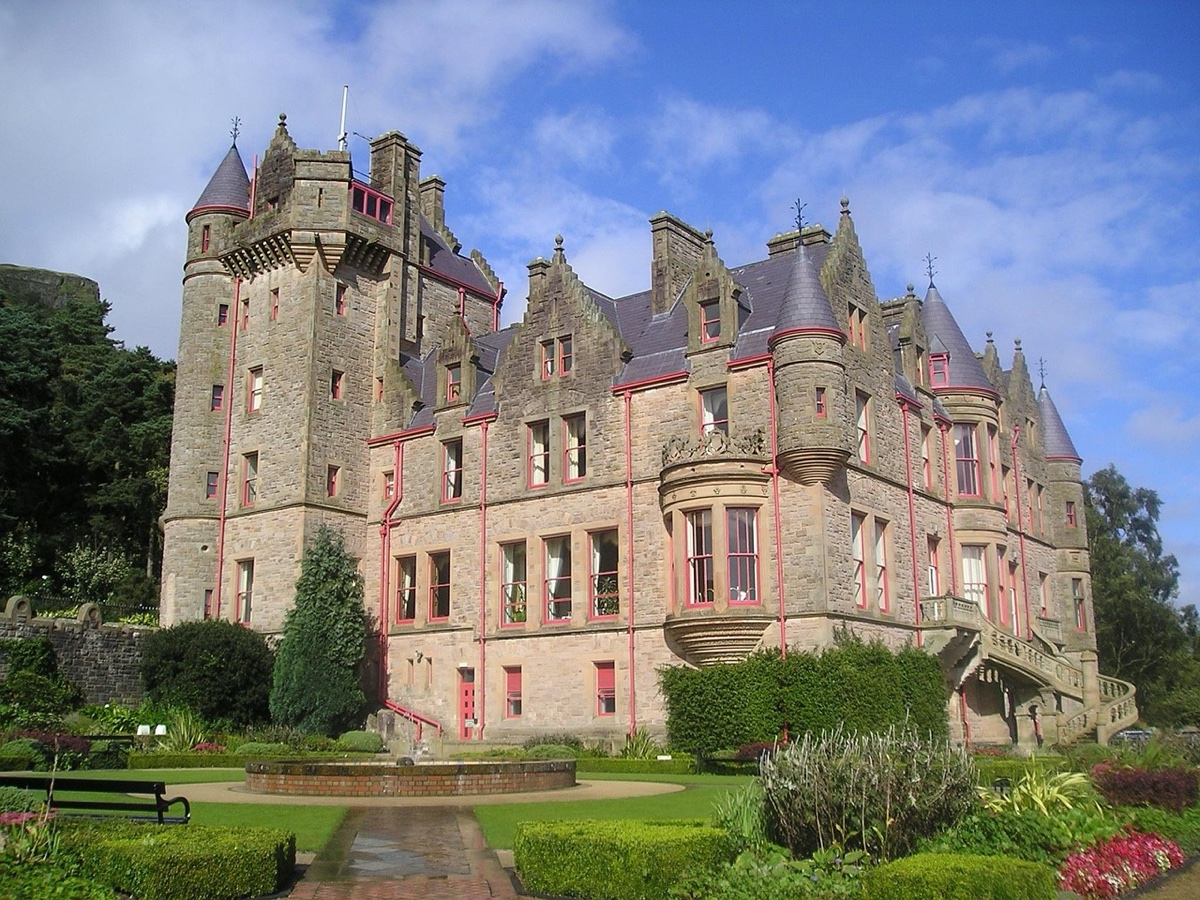 belfast castle rising proudly above its manicured gardens on cave hill