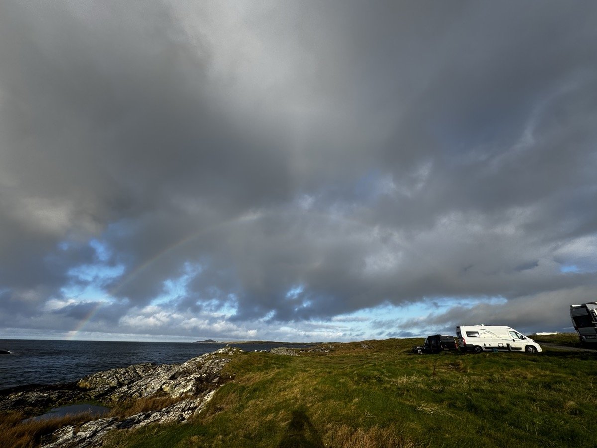 Clouds and a rainbow over the coast near Clifden