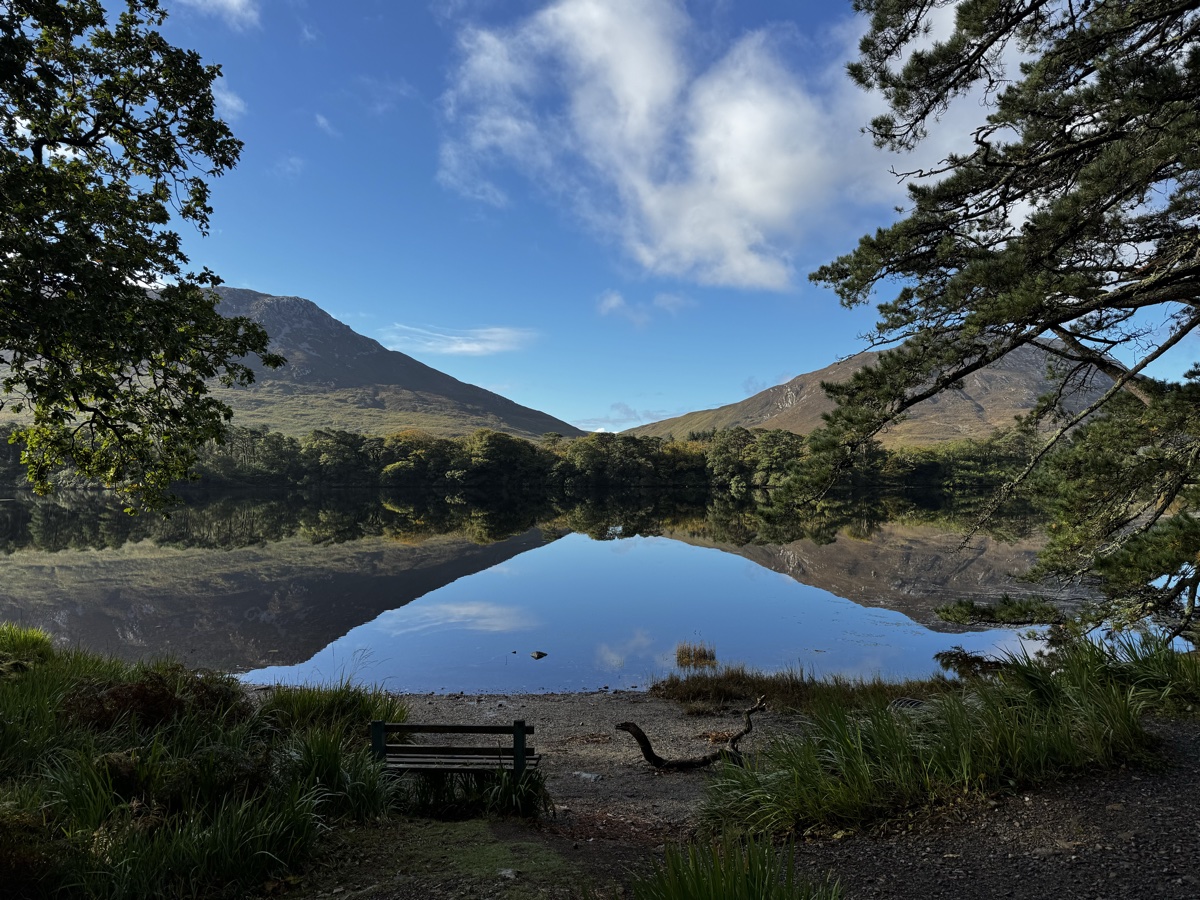 Mountains reflected in a lake in County Galway