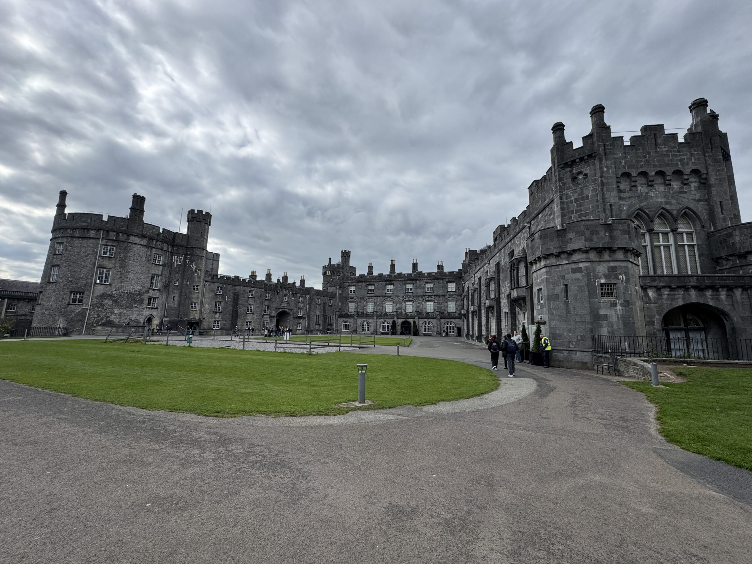 Kilkenny Castle wide courtyard and gothic arched entrance, County Kilkenny