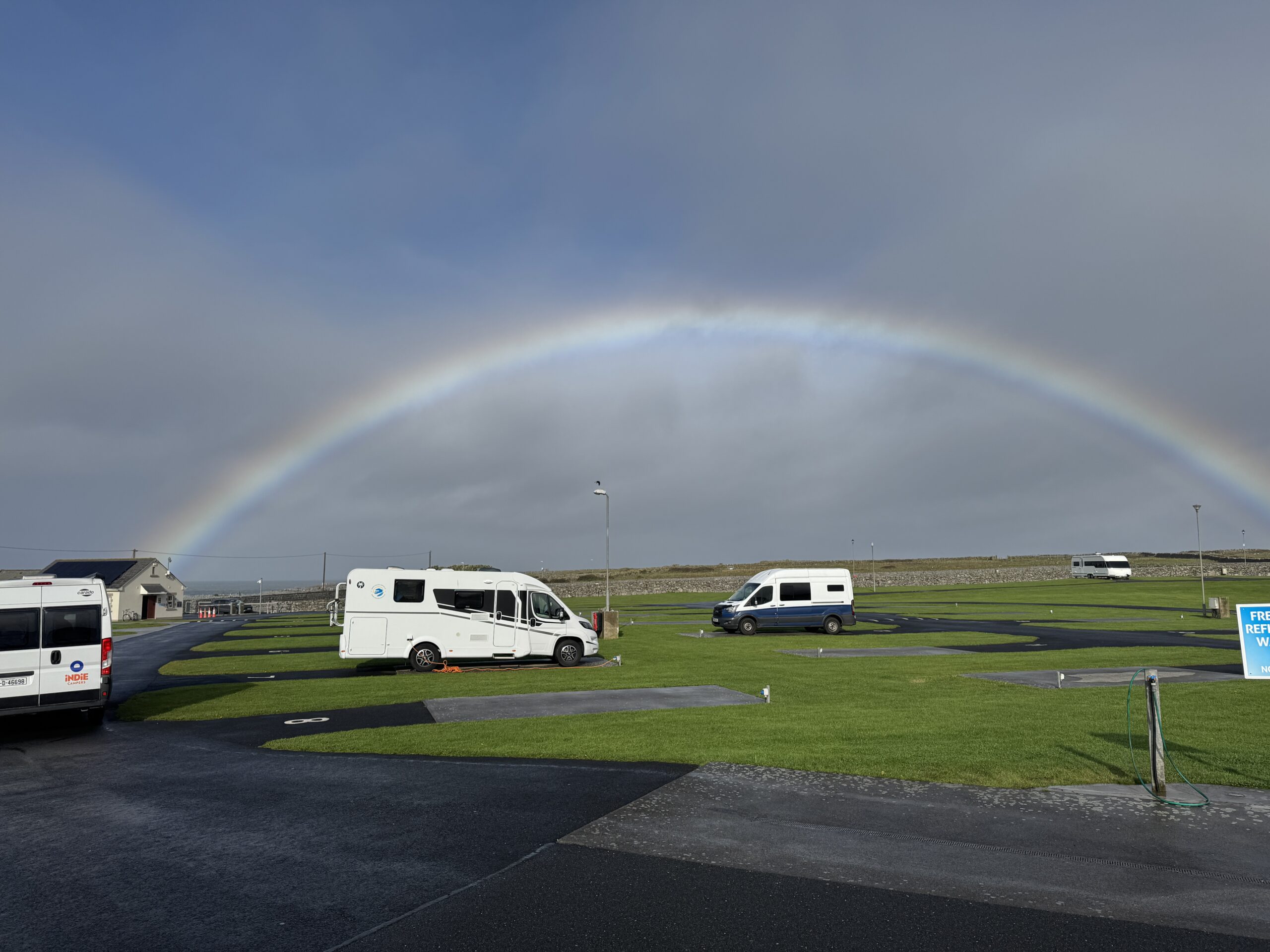 Rainbow over a campervan site near Doolin