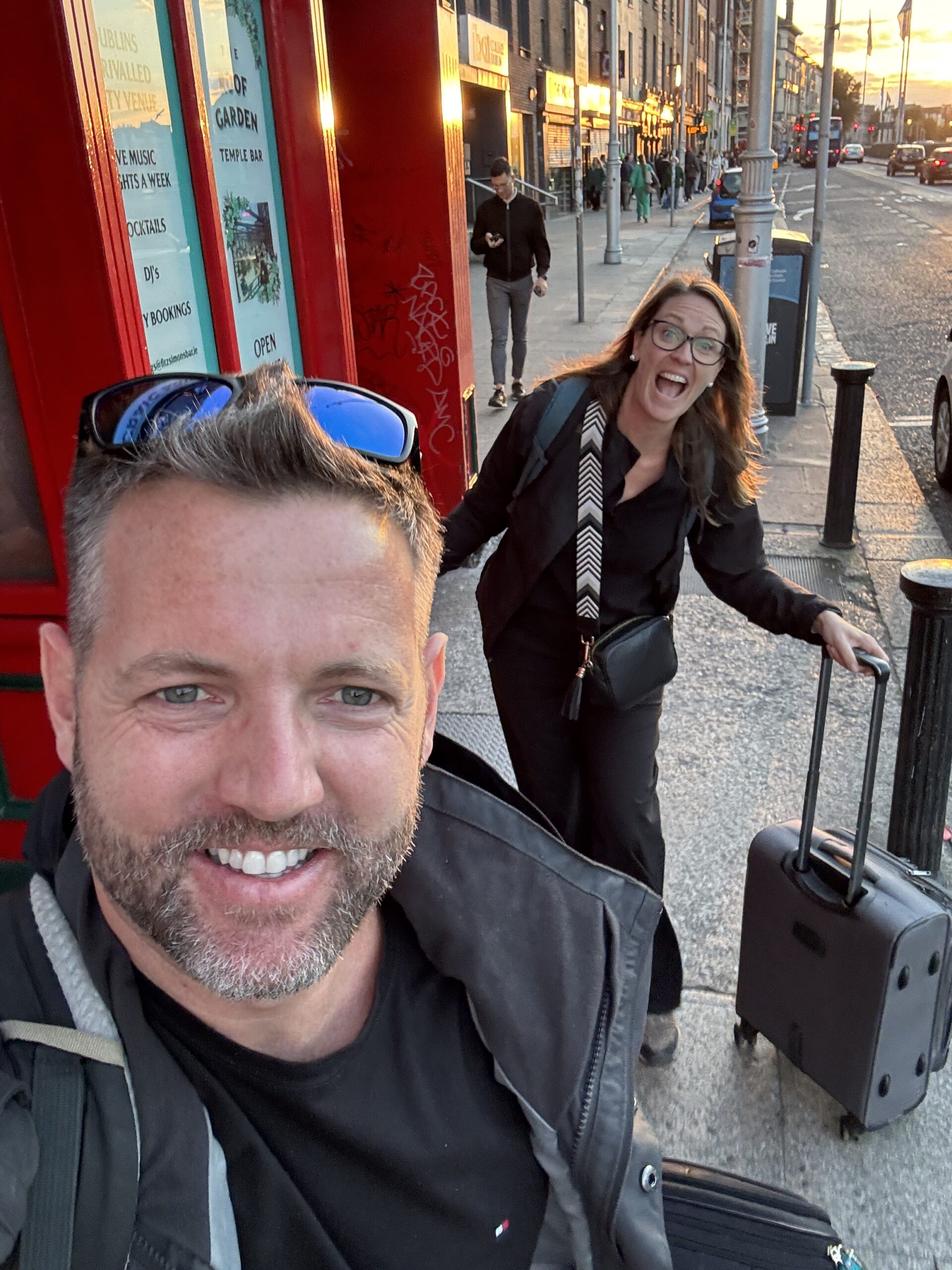 Nick and Dariece arriving on Temple Bar street in Dublin at sunset