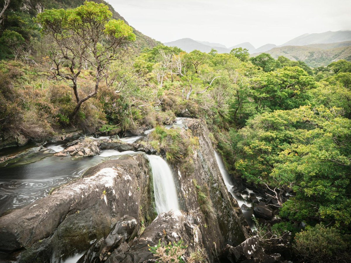 Waterfall and valley at Gleninchaquin Park on the Beara Peninsula, County Kerry