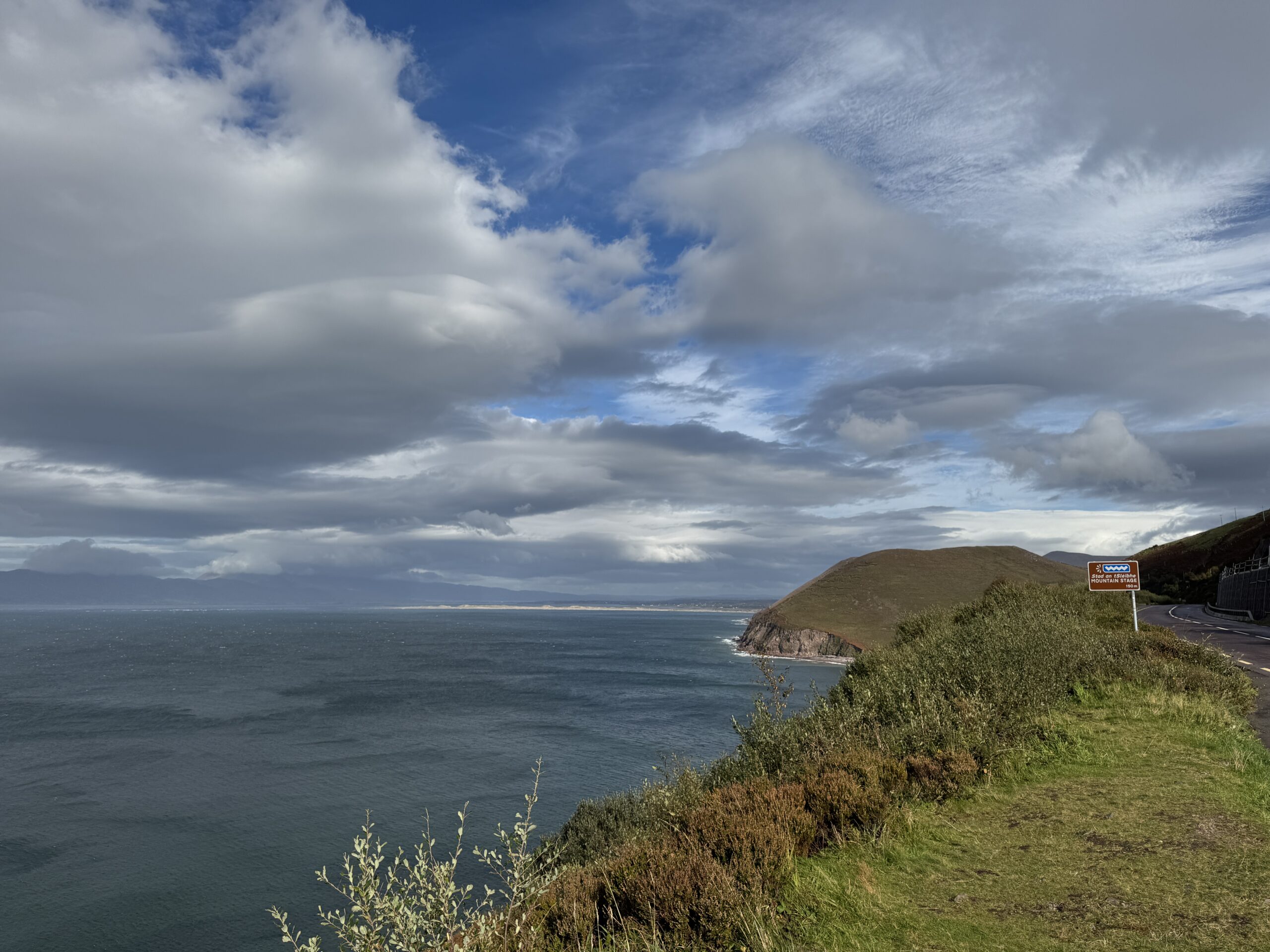 Dramatic coastal road in County Kerry with sea and headland views, Ireland