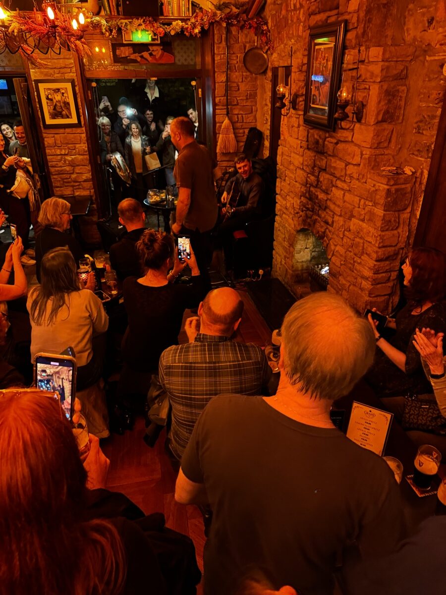 Packed live music performance at an intimate pub in Killarney, County Kerry, Ireland