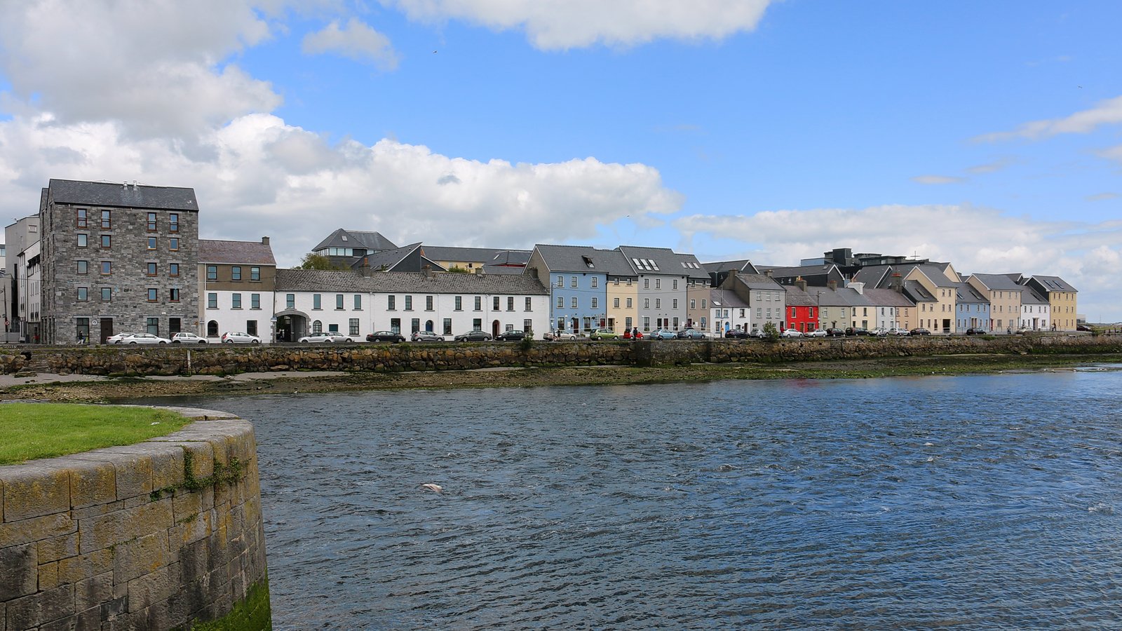The Long Walk row of colourful houses along the River Corrib in Galway