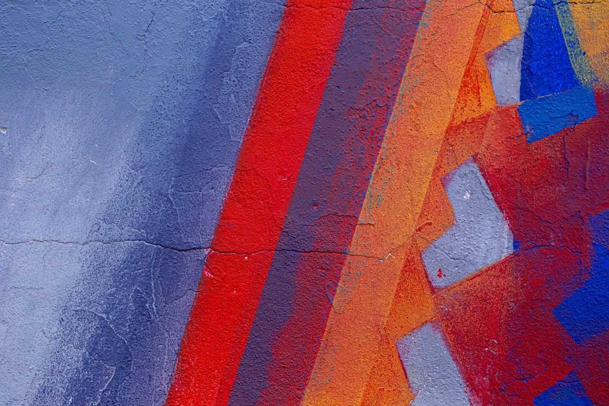 A colourful painted street-art wall like those around Galway