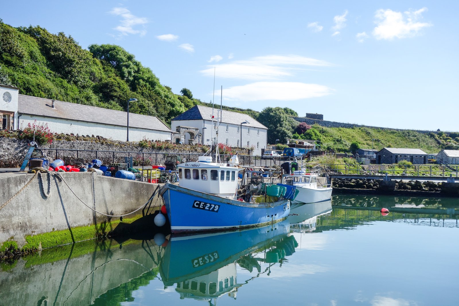 Fishing harbour with a blue boat near Rathlin Island