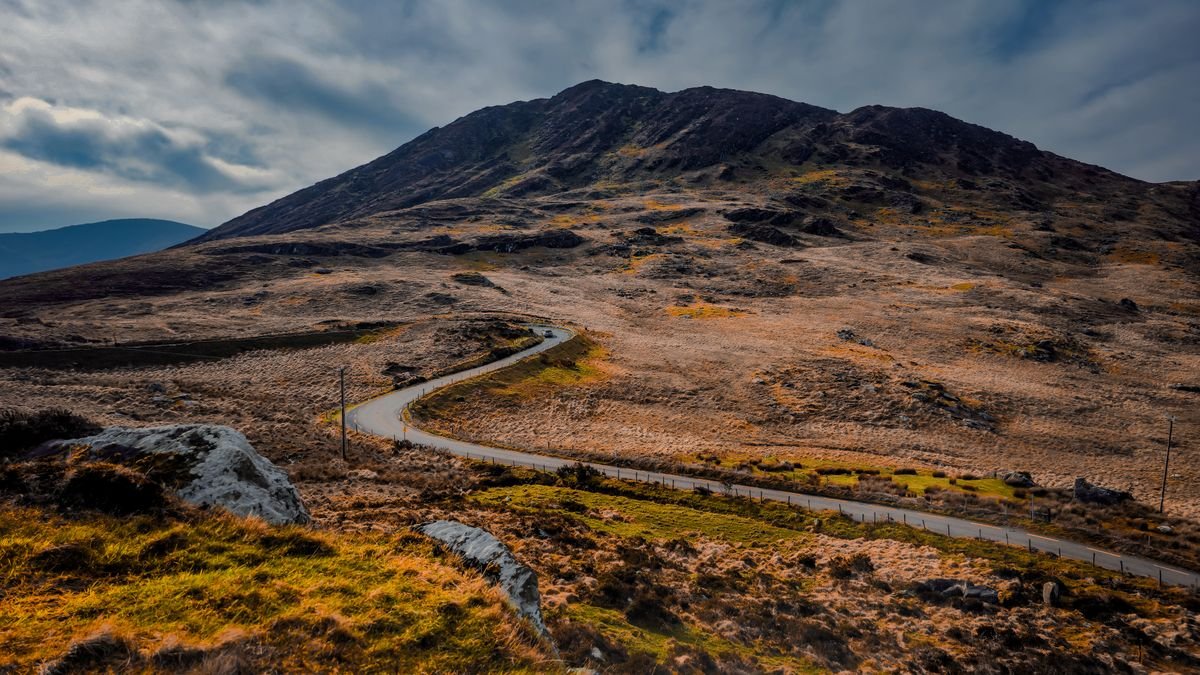 A winding road through the Connemara mountains, an easy drive from Galway
