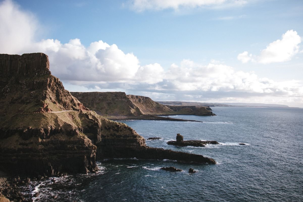 Sweeping Causeway Coast cliffs and sea