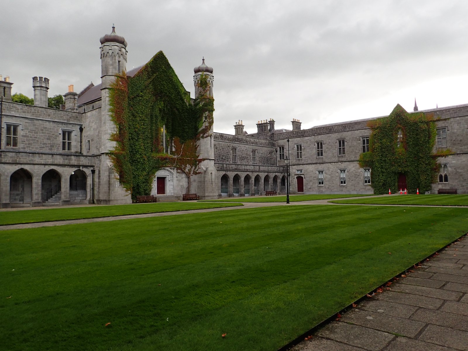 The old Quadrangle building and lawn at the University of Galway