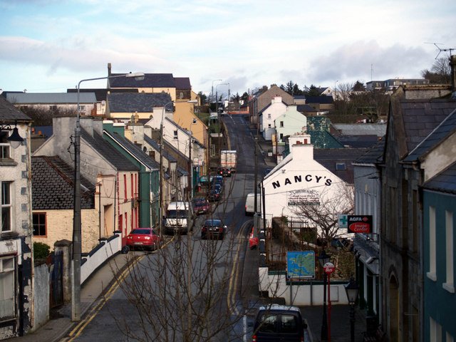 Front Street descending the hill past colourful pubs in Ardara, County Donegal