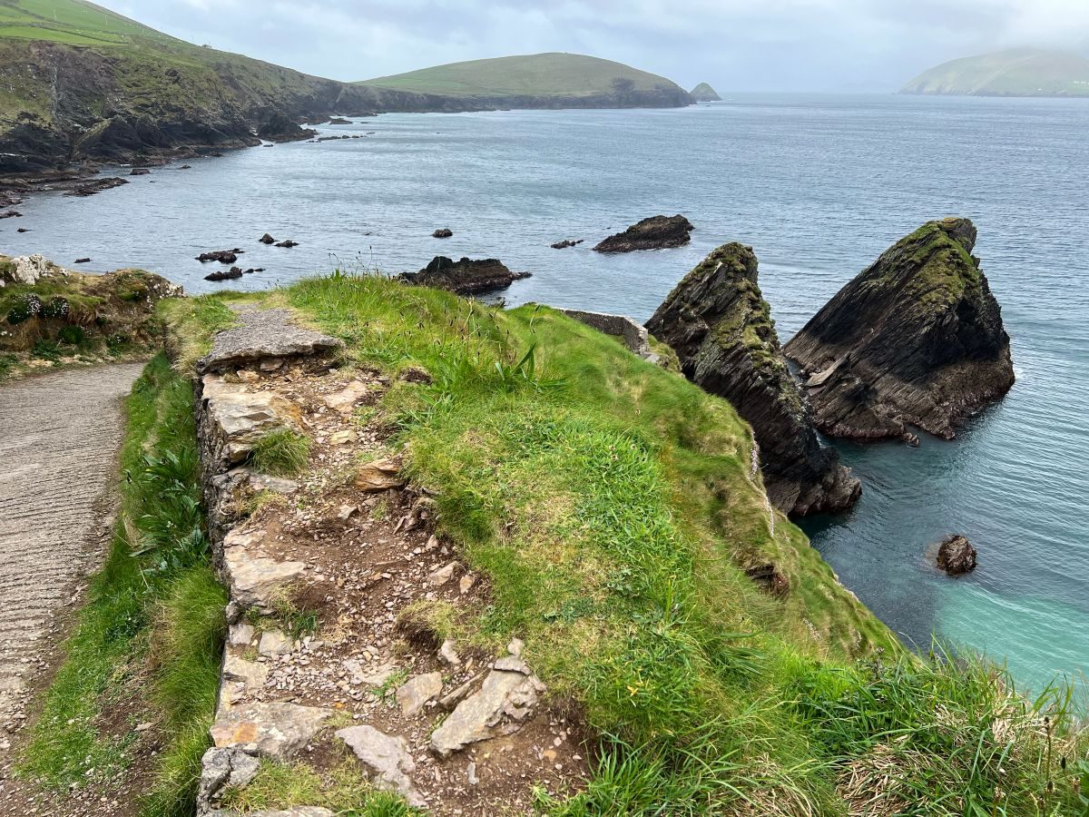 A clifftop coastal walking path above the Atlantic