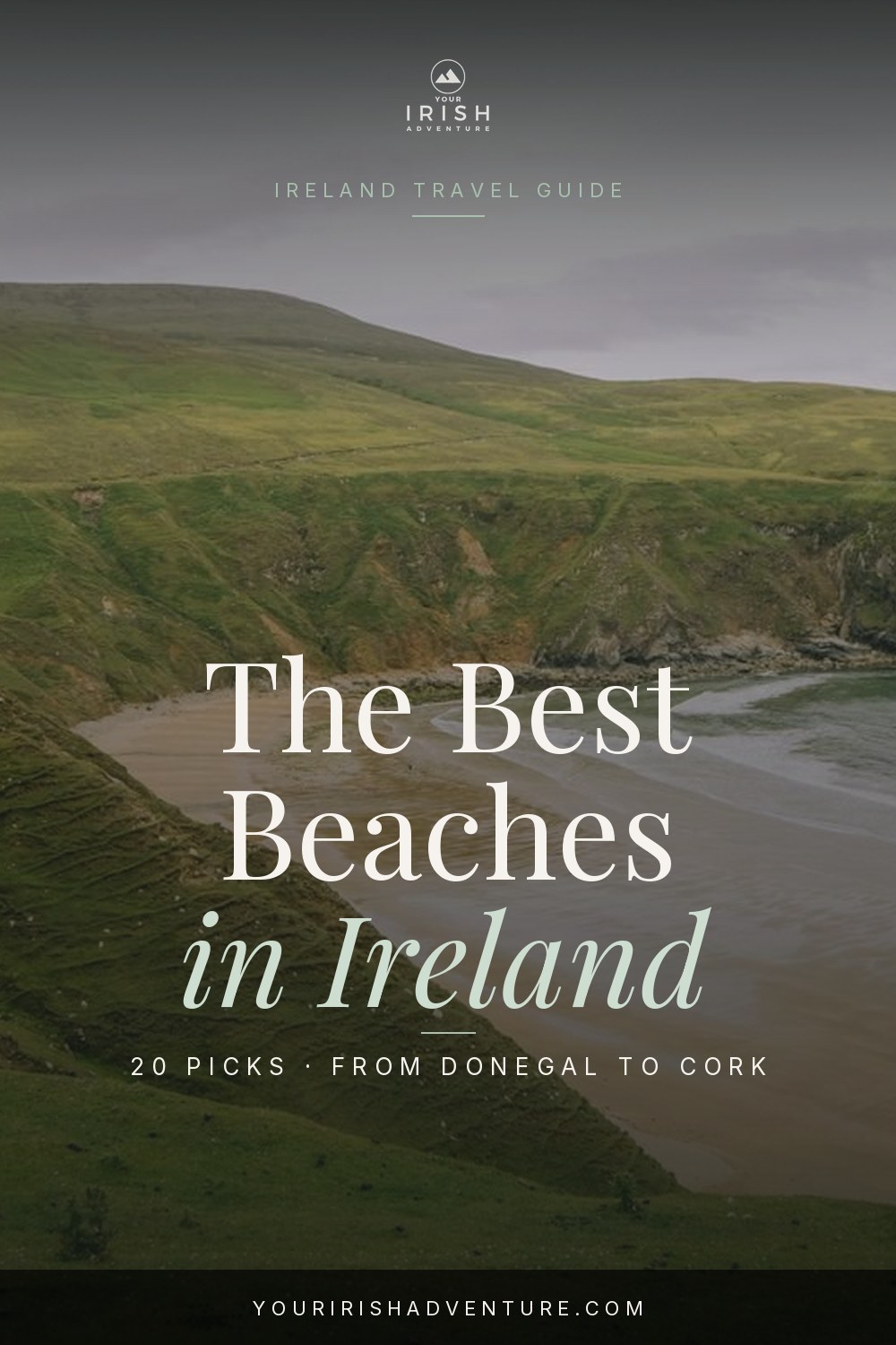 Wide golden sand beach with green headlands and blue Atlantic water on the Irish coast