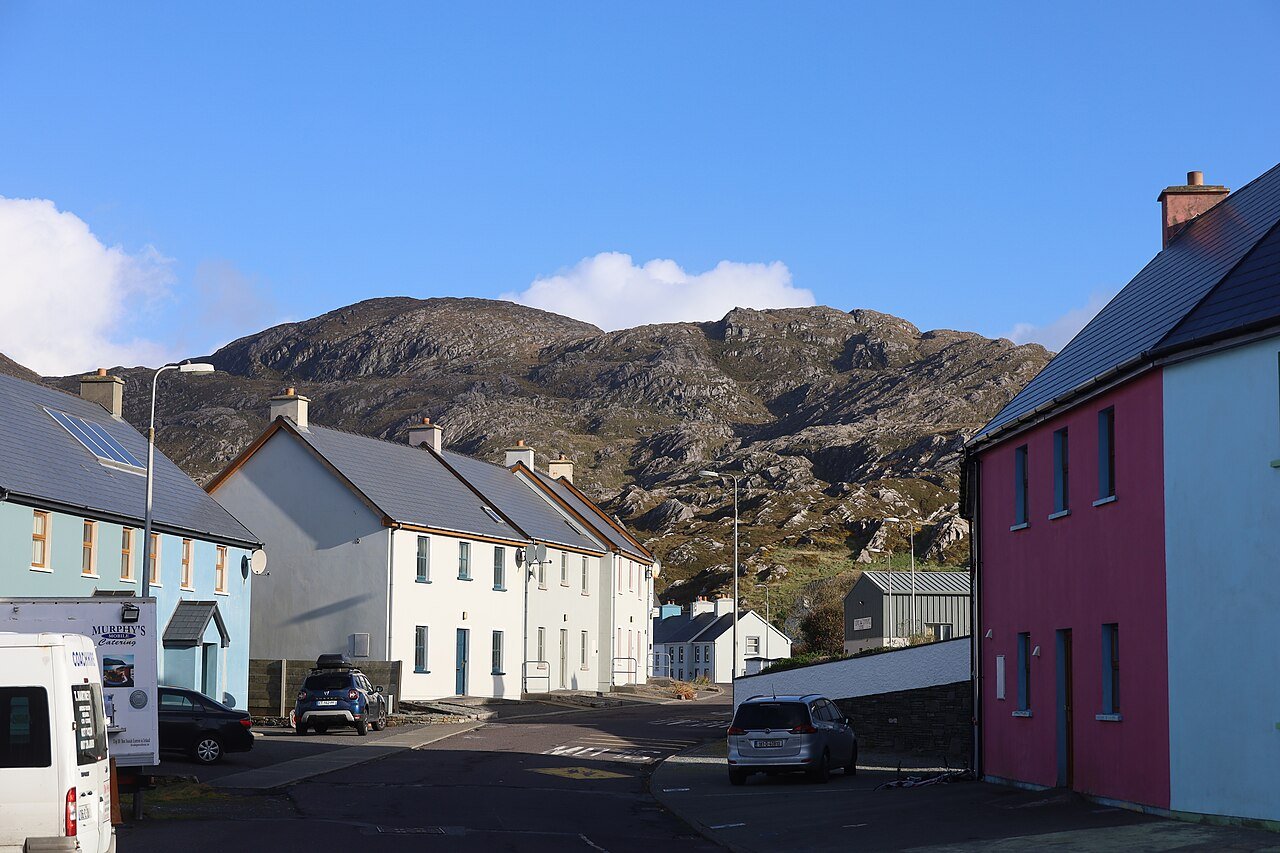 Painted houses of Allihies village against the Slieve Miskish mountains on the Beara Peninsula