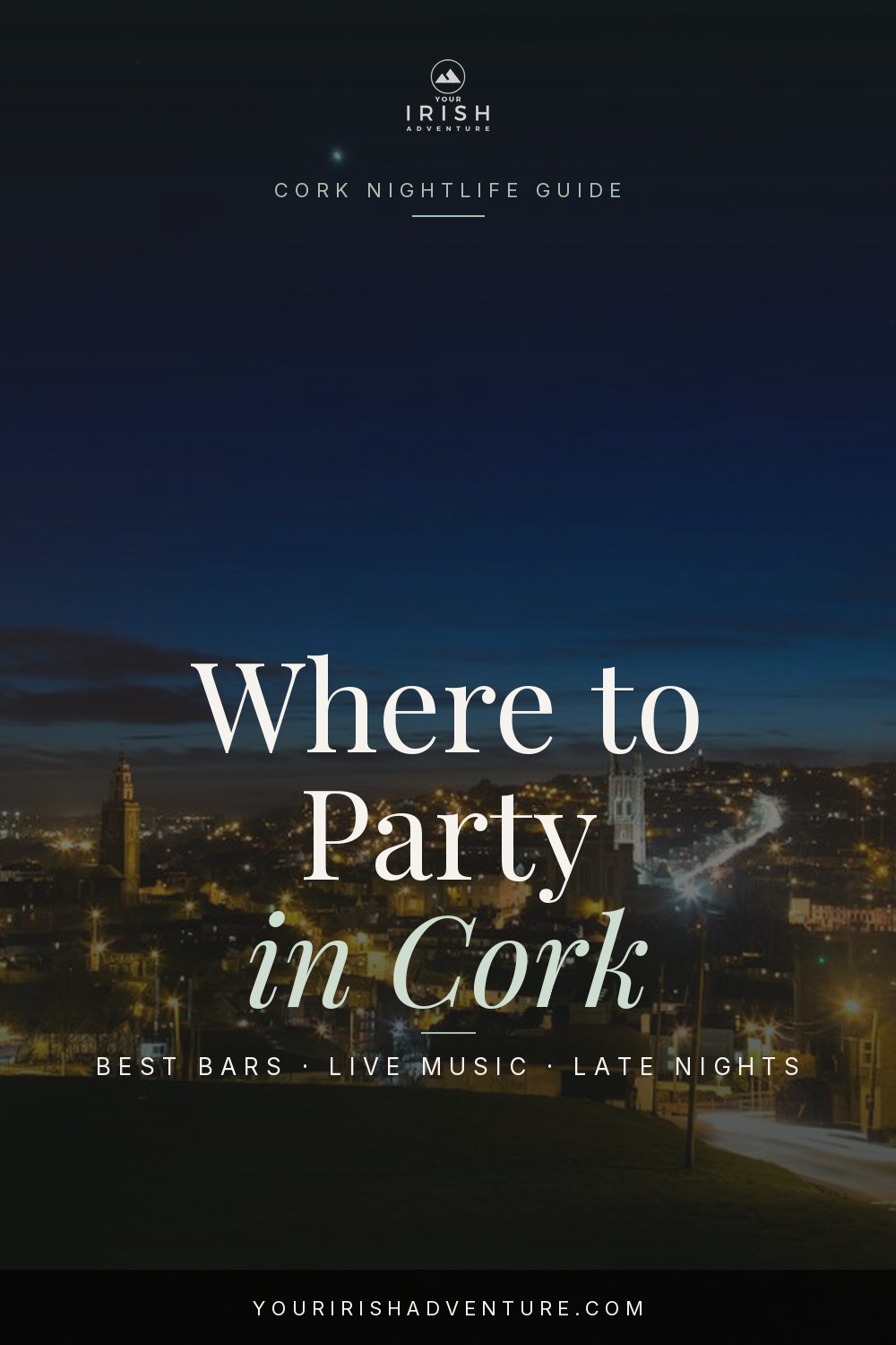 Cork city street at night with pub lights and people heading out for nightlife in Ireland