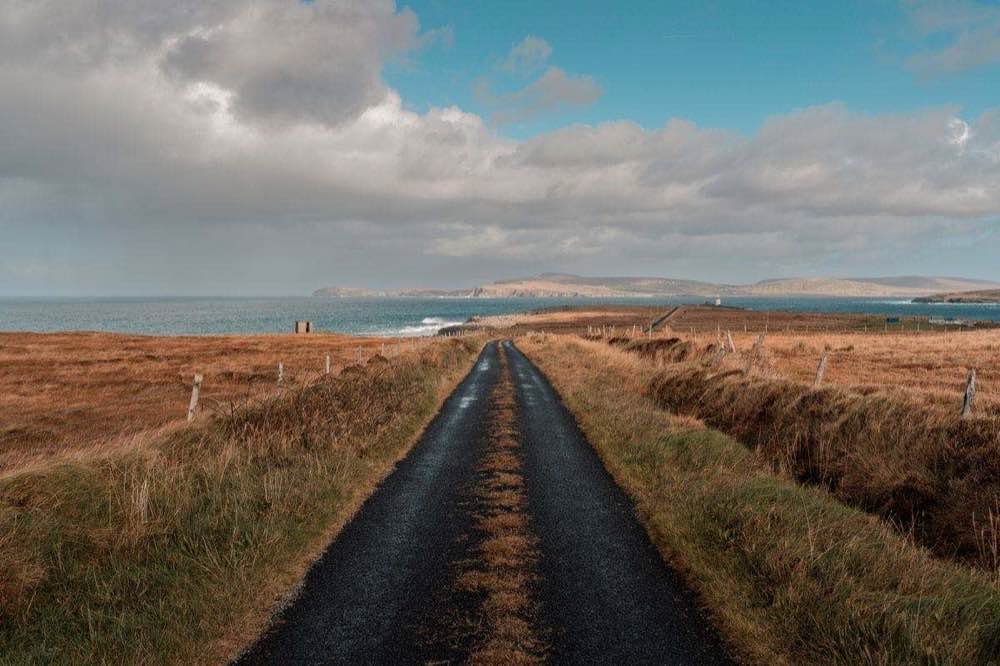 A single-track road running out to the coast in Donegal