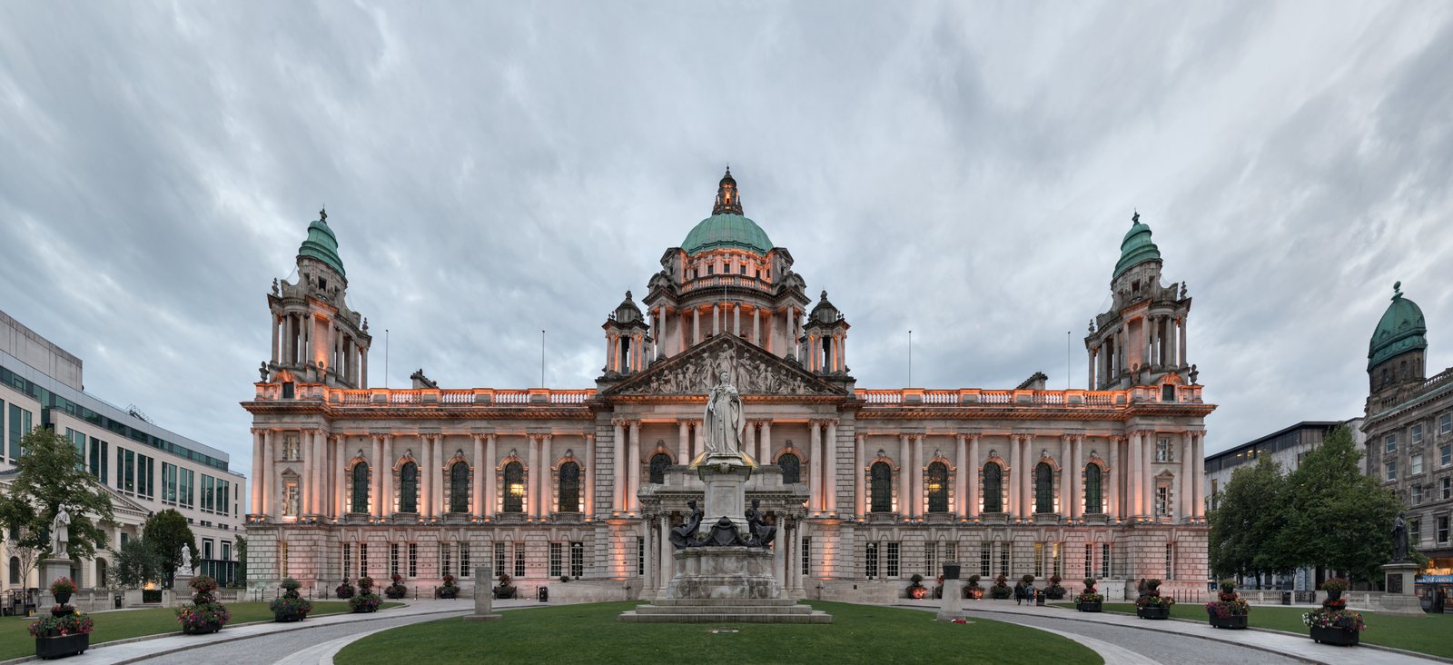 Belfast City Hall lit up at dusk