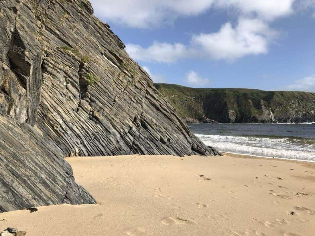 Silver Strand beach in a horseshoe cove near Malin Beg, Donegal