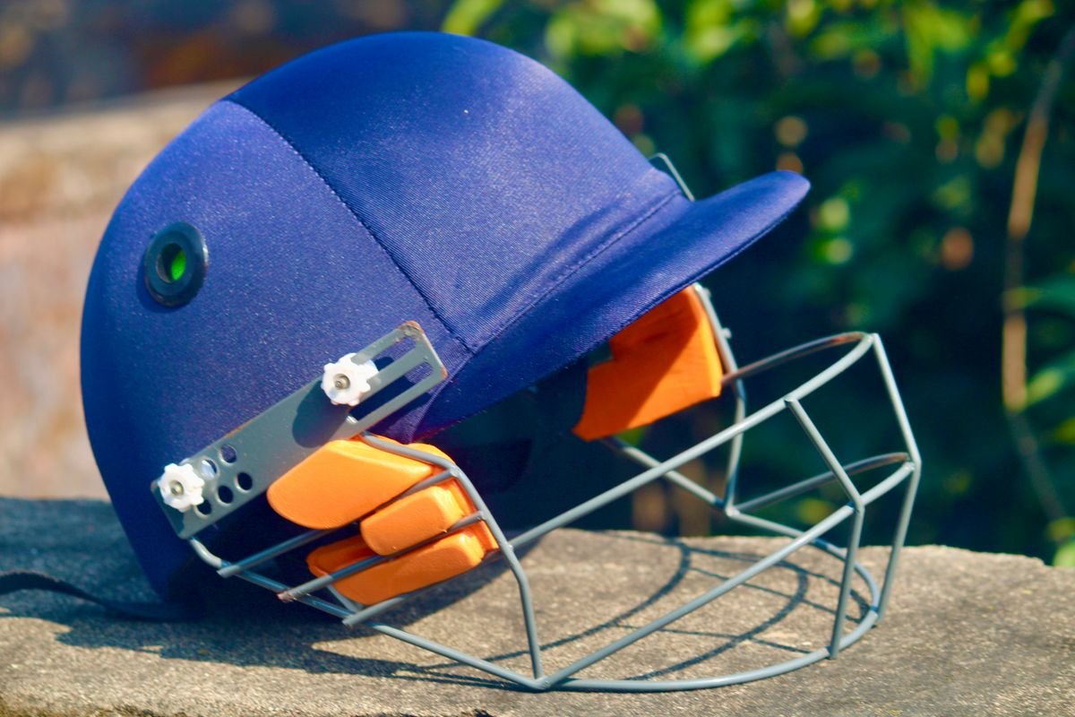 A hurling helmet with a metal faceguard cage