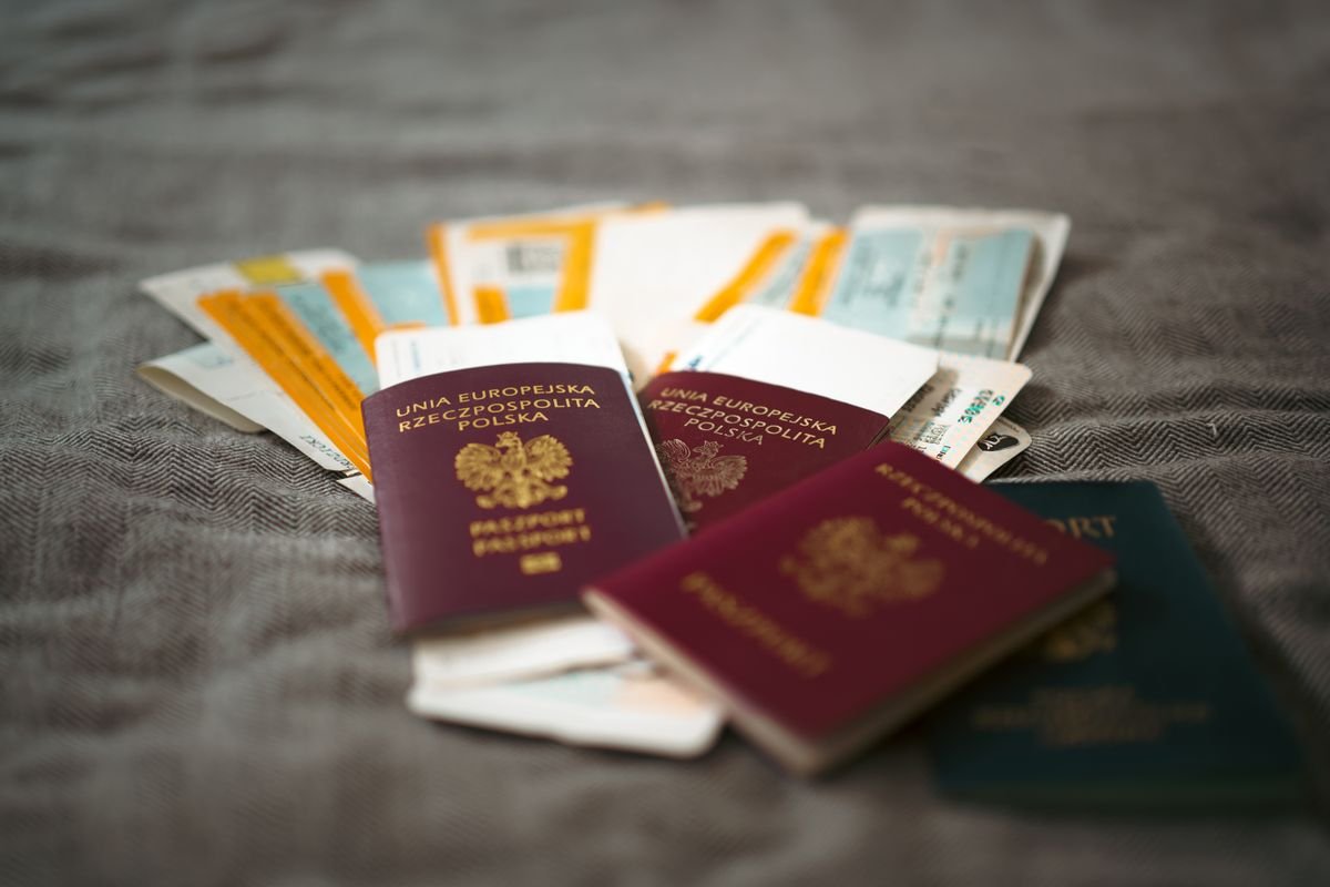Passport and travel documents laid out before an Ireland trip