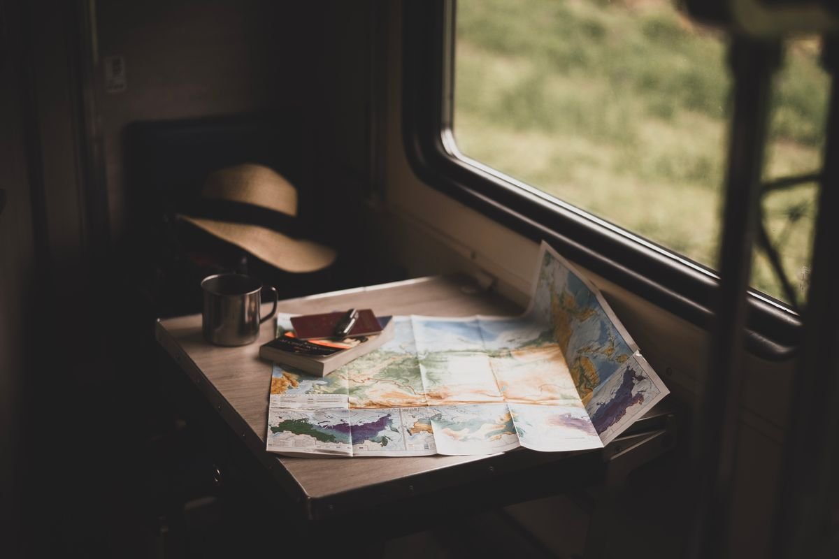A road map and coffee on a table
