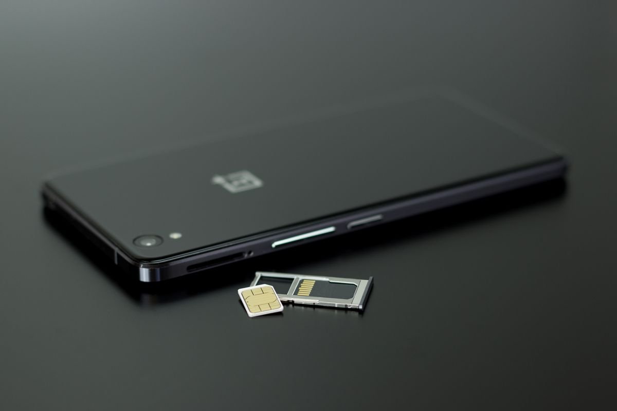 A SIM card and a phone SIM tray