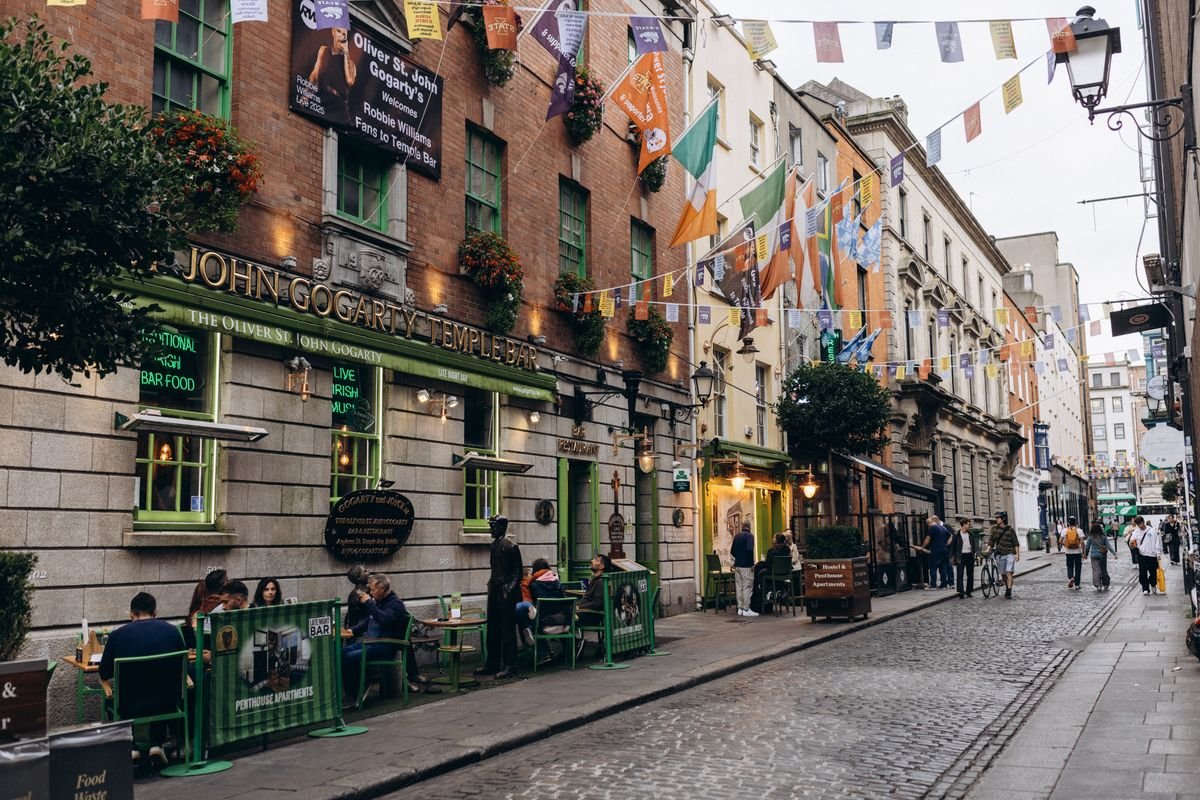 Outdoor cafe seating on a Temple Bar street in Dublin in June