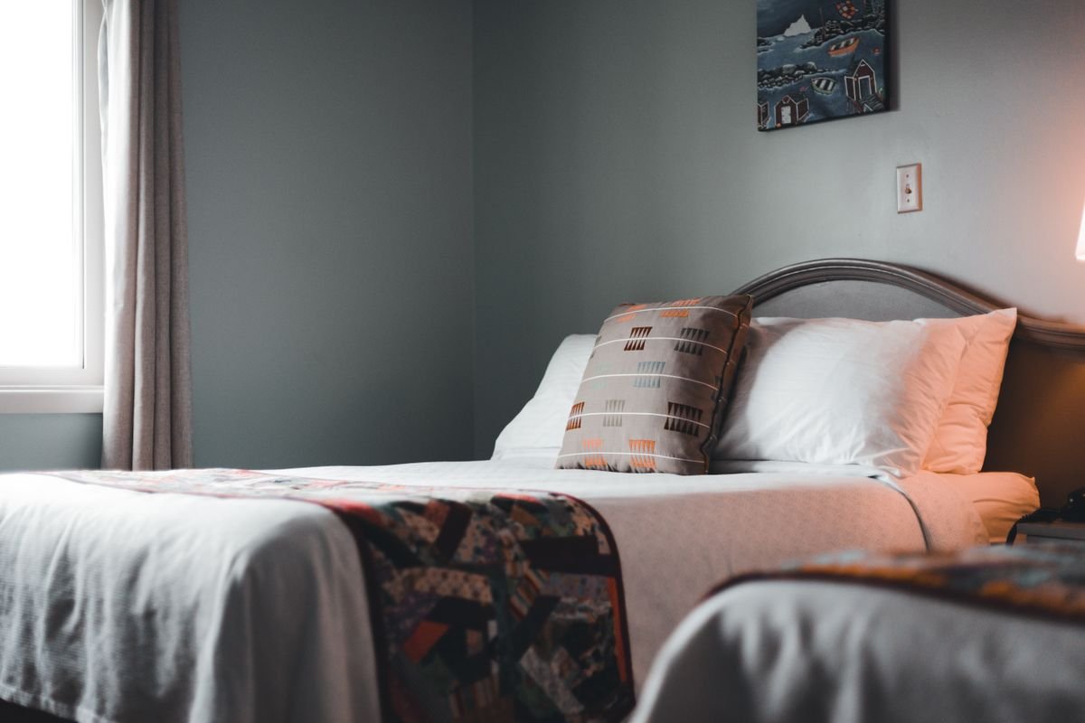 A cozy guest room with quilts in an Irish bed and breakfast