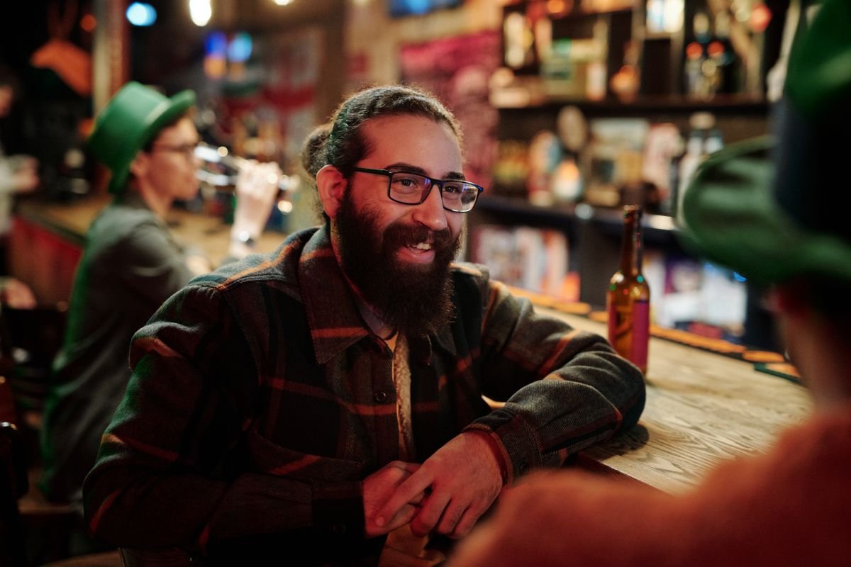 People chatting in a warm pub