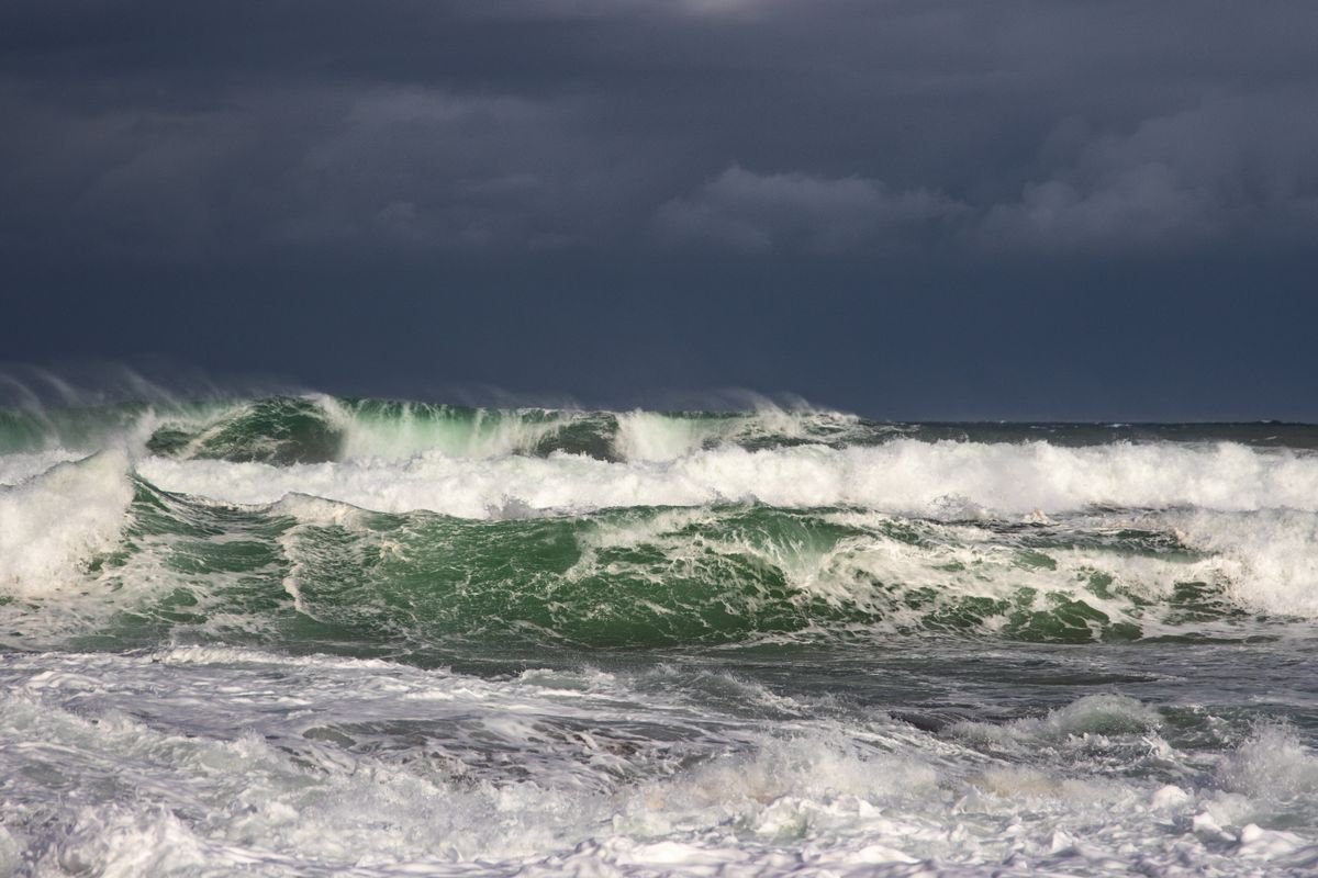 A rough, stormy Atlantic sea under dark winter clouds off the Irish coast