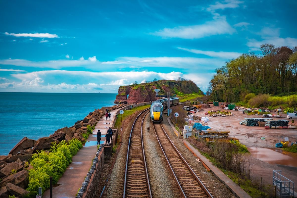 A train running along the coastline on the route to Derry