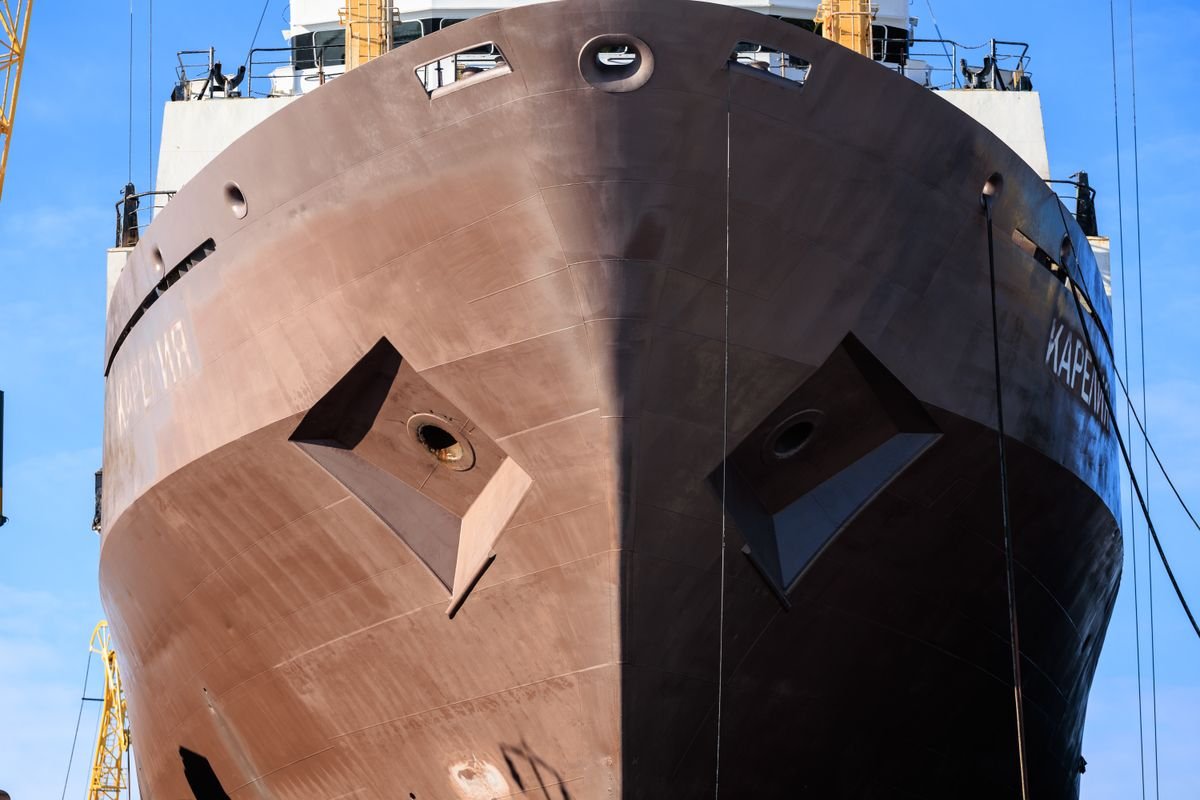 Huge ship hull bow under construction in a shipyard