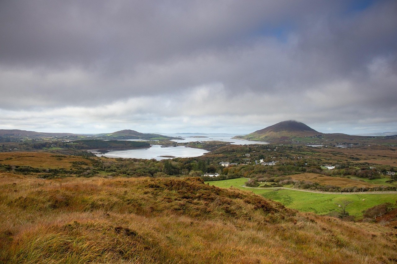A wide Connemara view of loughs and hills under cloud