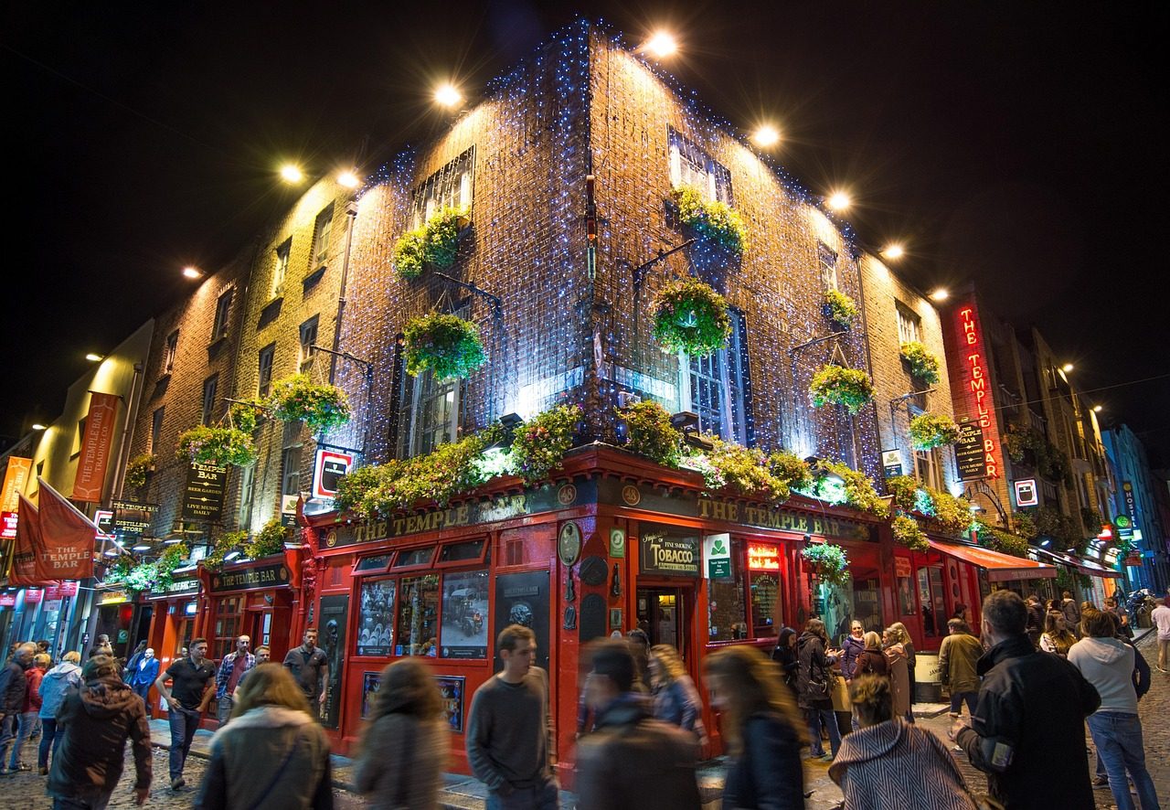 The Temple Bar pub lit up at night in Dublin