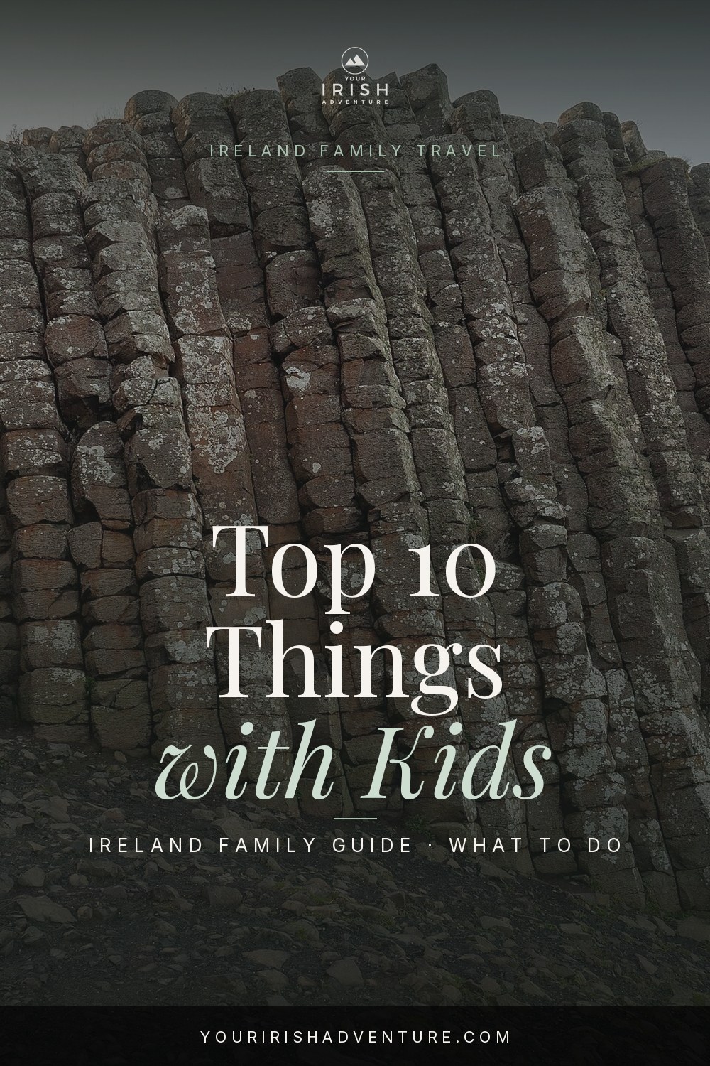 Family walking a green Irish countryside path with castle in background, top things to do in Ireland with kids