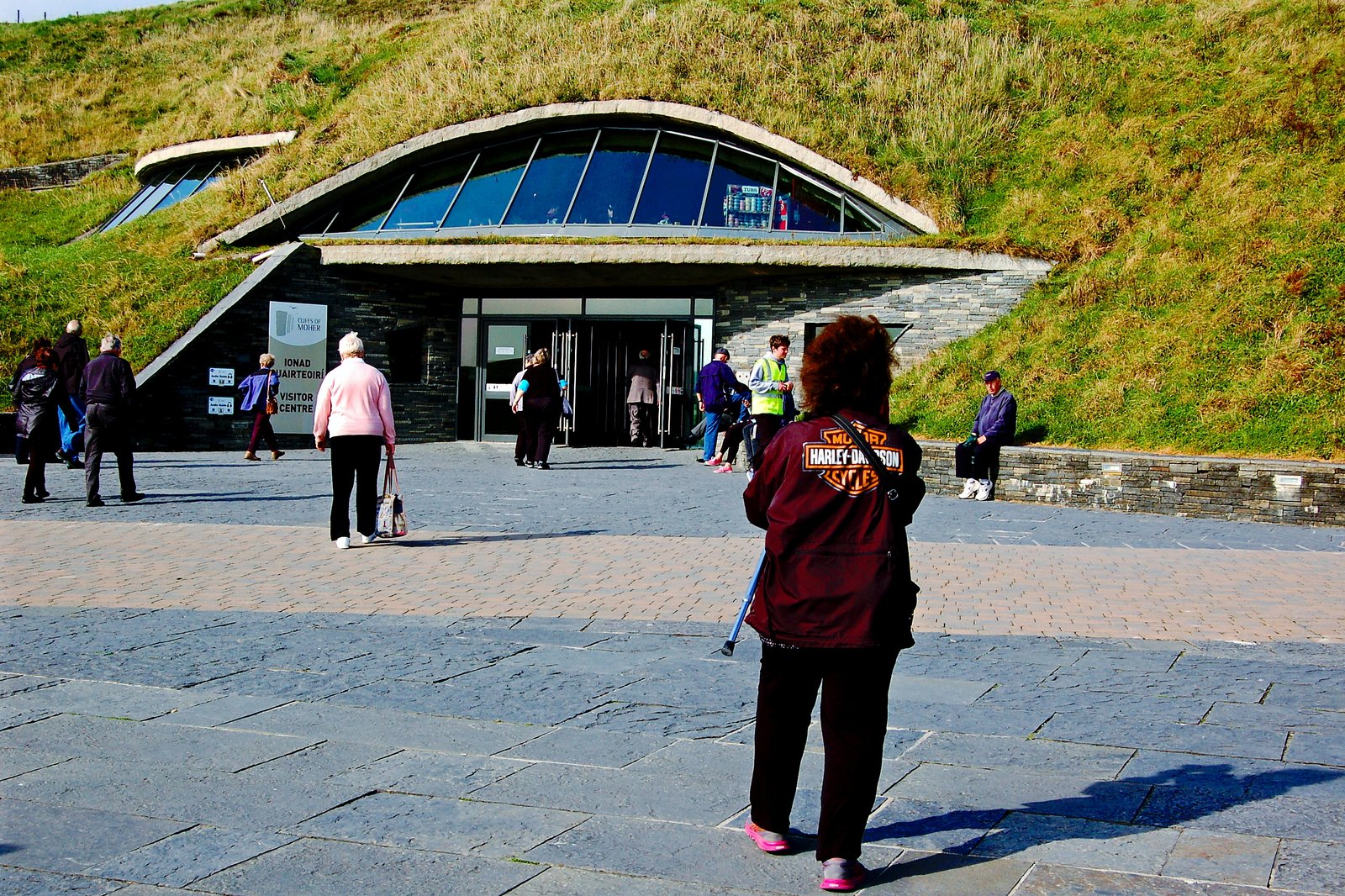 The grass-roofed Cliffs of Moher visitor center entrance