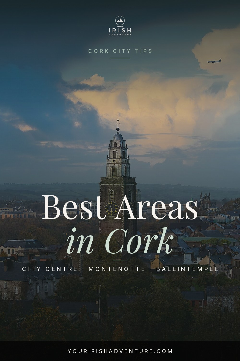 View over Cork city rooftops with St Anne's church tower and the river below
