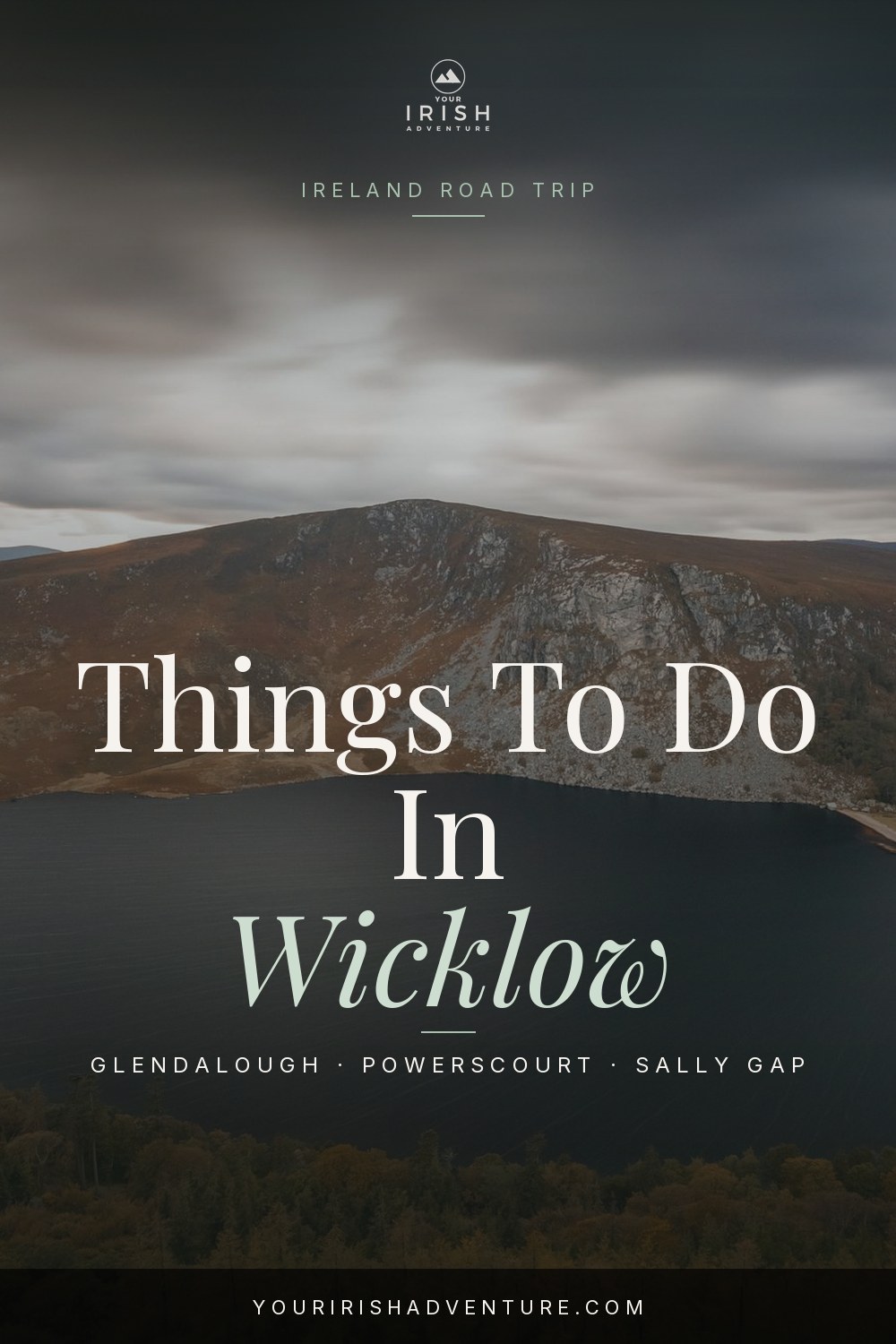 Glendalough lake and round tower in County Wicklow Ireland on a misty morning