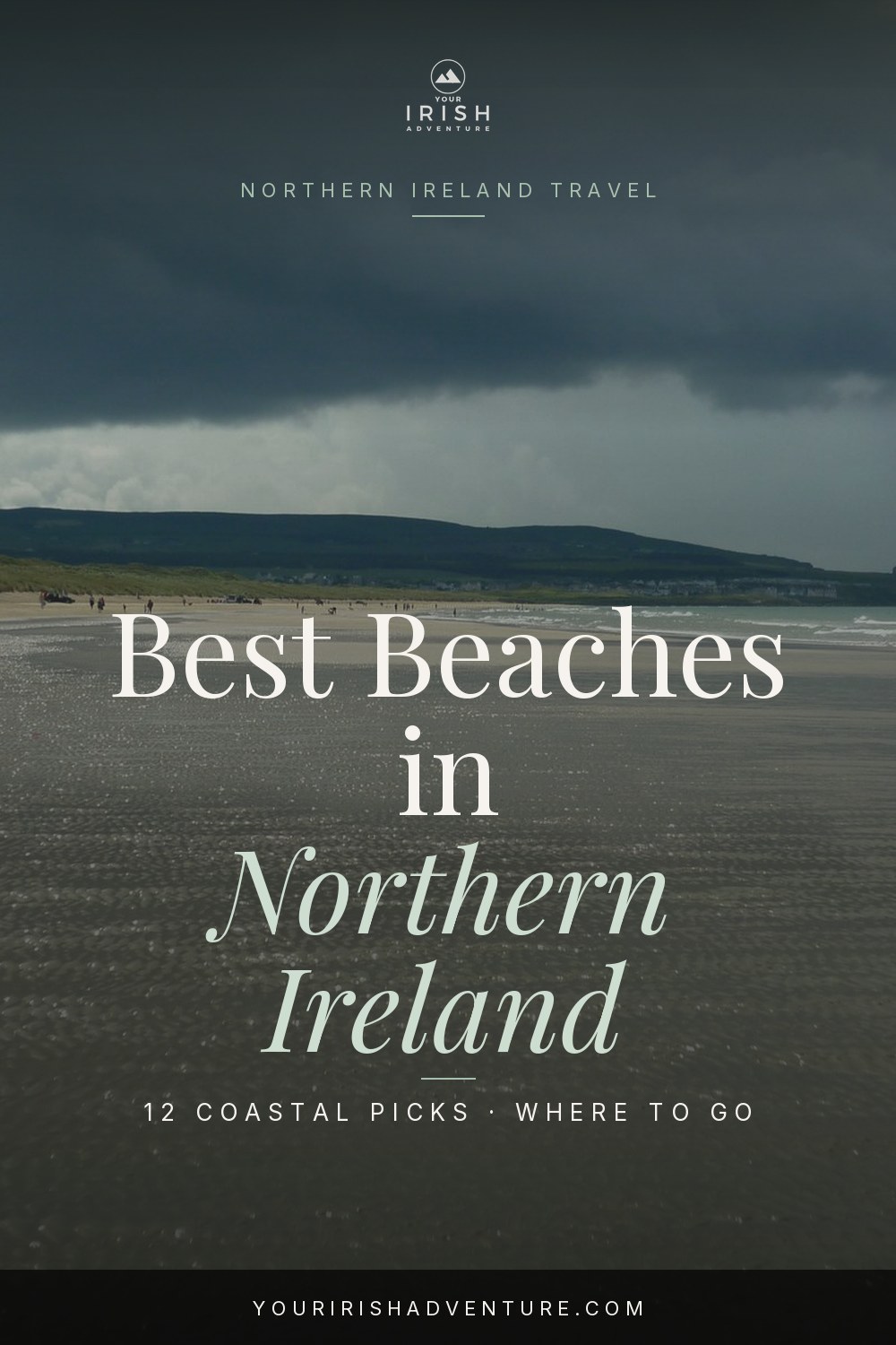 Wide sandy bay backed by green cliffs on Northern Ireland's Causeway Coast