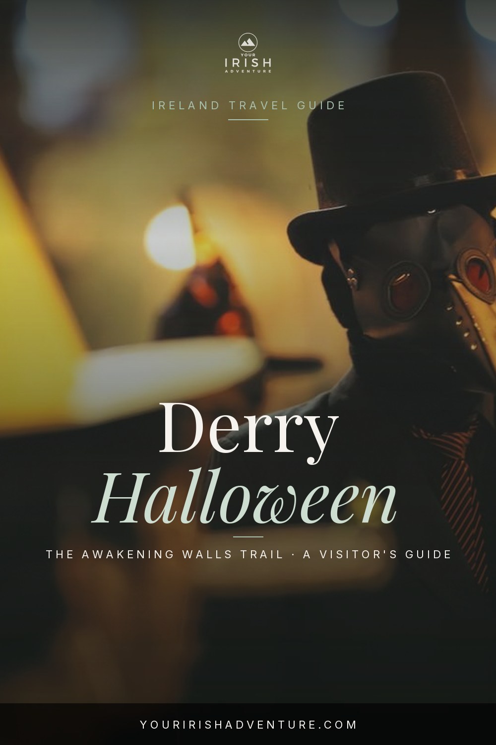 Illuminated 17th-century city walls at night during the Derry Halloween Festival in Northern Ireland