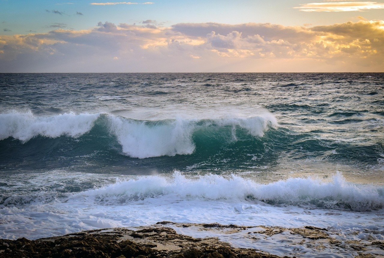 Waves breaking on the Atlantic coast at dusk