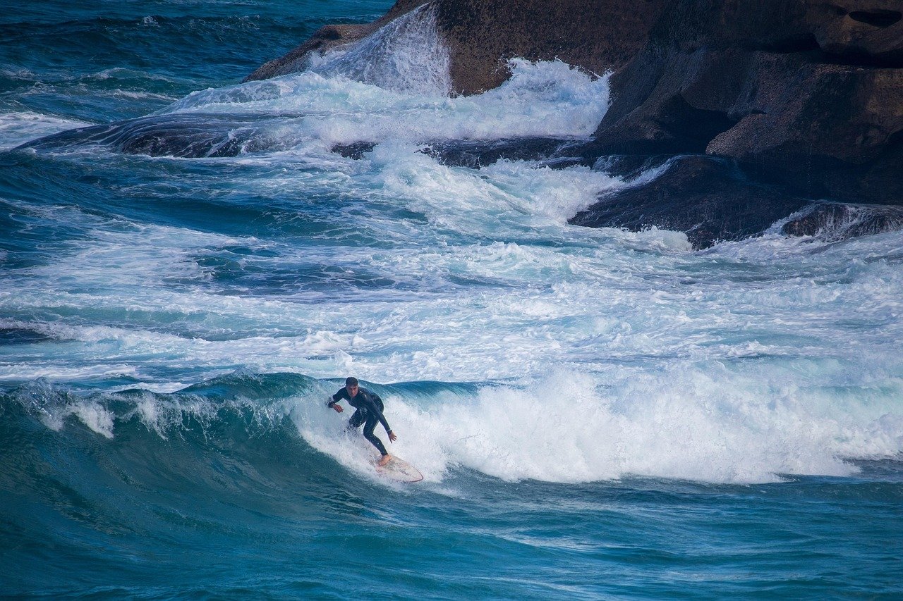 Surfer riding a wave on the Irish Atlantic coast