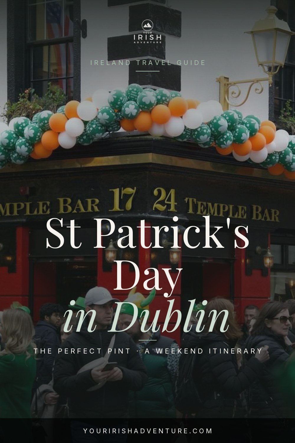 Crowds and green flags along a Dublin street during the St Patrick's Day parade