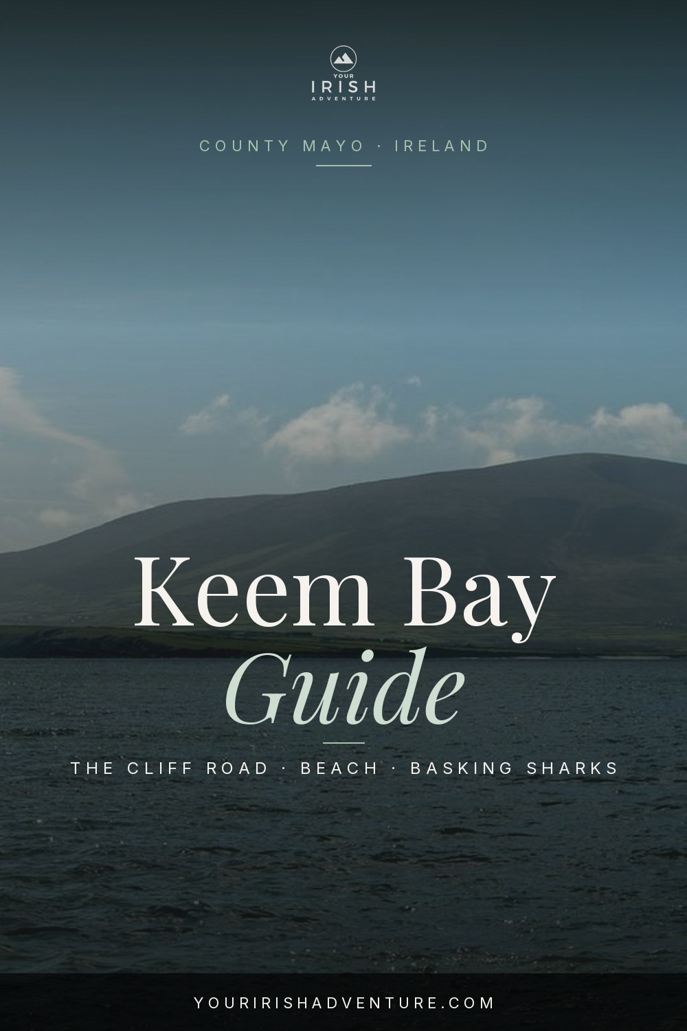 Winding cliff road down to Keem Bay beach and turquoise water on Achill Island, Ireland