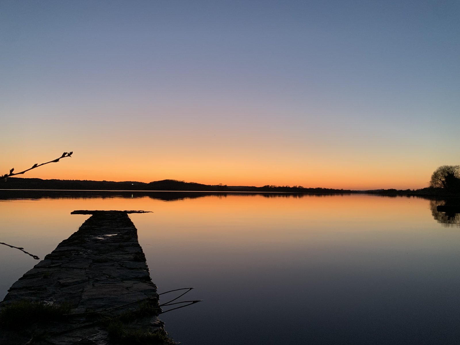 Stone jetty on Lough Erne at sunset