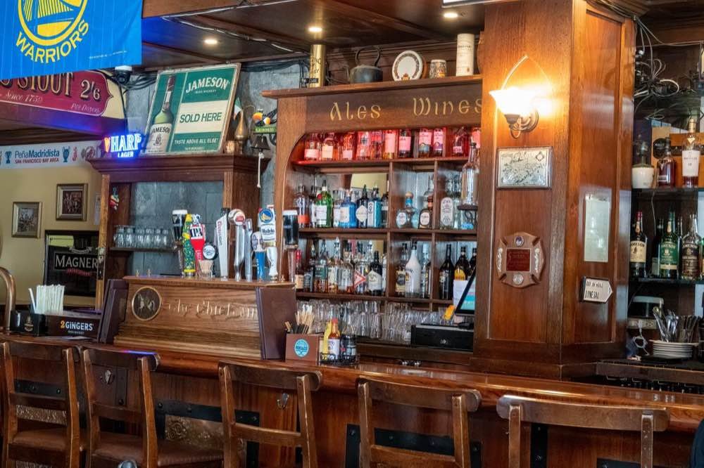 Dark wood back bar at a traditional Irish pub